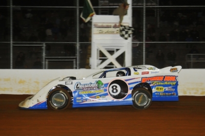 Mark Pettyjohn takes the checkers at Winchester. (Travis Trussell)