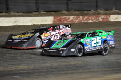 Terry Phillips (75) turns back Chad Simpson on his way to victory. (Todd Boyd)