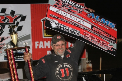 Kevin Weaver enjoys victory lane at one of his home tracks. (Jeff Hall)