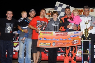 Travis Dickes and his supporters enjoy victory lane. (Joe Orth)