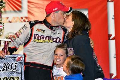 Sandra Miller kissed husband Matt in victory lane. (thesportswire.net)
