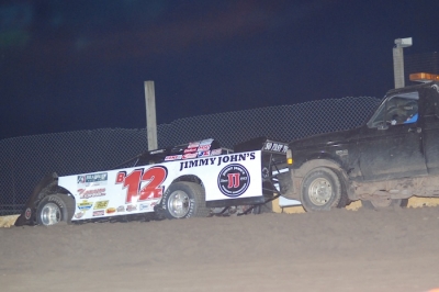 Kevin Weaver is pushed off the track. (DirtonDirt.com)