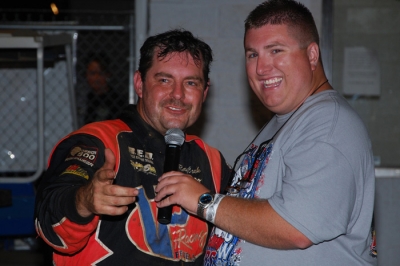 Winner Ray Cook (left) shares a laugh with announcer Chris Tilley in victory lane. (photobyconnie.com)
