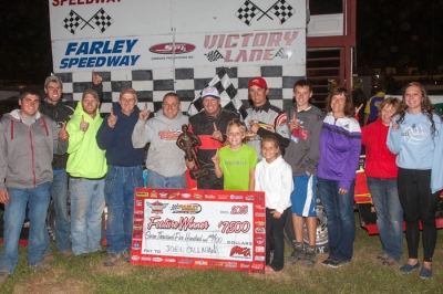 Joel Callahan's team celebrates his biggest victory. (Dan Busch)