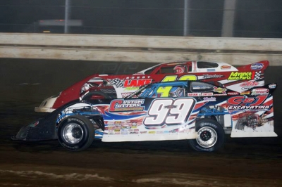 Donnie Moran (99) took the lead with four laps remaining. (Todd Battin)