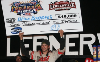 Birkhofer shows off his big check. (Todd Battin)