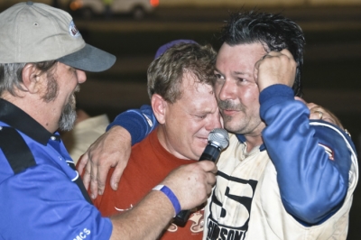 James Powell III hugs winner Ivedent Lloyd Jr. (right) in 2009. (Chuck Green)