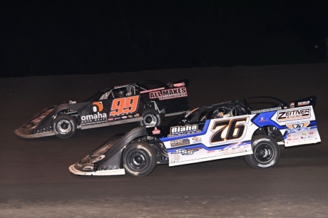 Jesse Sobbing (99) repels Zach Zeitner (76). (photofinishphotos.com)