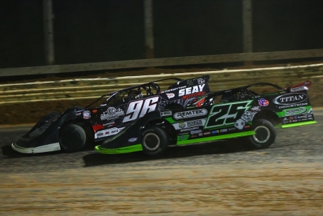 Tanner English (96) leads Jason Feger (25). (joshjamesartwork.com)