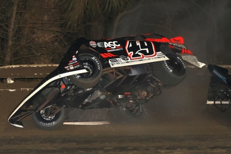 Jonathan Davenport crashes on the opening lap. (Mike Ruefer)