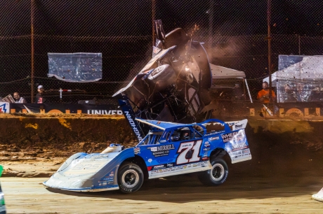 Trey Mills rolls as Hudson O'Neal (71) makes contact. (Heath Lawson)