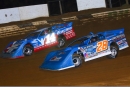 Josh Richards (14) battles Dennis Erb Jr. (28) for the lead at Duck River Raceway Park during Friday's World of Outlaws Morton Buildings Late Model Series main event. Richards grabbed the spot and went on to a $10,000 victory. (joshjamesartwork.com)