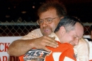 Mike Head (left) hugs Ronnie Johnson after one of his four Michael Head Jr. Memorial victories at Talladega Short Track. Head died Feb. 22, 2021, at the age of 69. (Brian McLeod/Dirt Scenes)