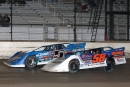 Brandon Sheppard (B5) overtakes Garrett Alberson (58) to lead the final two laps Jan. 9 at Vado (N.M.) Speedway Park in the second round of the Wild West Shootout presented by O&#039;Reilly. (mikerueferphotos.photoreflect.com)