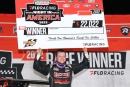 Hudson O&#039;Neal shows off his paycheck May 18 after his Castrol FloRacing Night in America victory at Marshalltown (Iowa) Speedway. (mikerueferphotos.photoreflect.com)