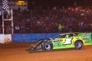 Tyler Erb takes the checkered flag at Red Hill Raceway in Sumner, Ill., which reopened after a 17-year hiatus by hosting June 28&#039;s DIRTcar Summer Nationals event. (joshjamesartwork.com)
