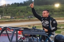 Zach Milbee gives a thumbs up after winning Saturday&#039;s Steel Block Late Model Series main event at Brushcreek Motorsports Complex in Peebles, Ohio. He earned $1,200. (Josh Wilson)
