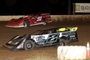Tyler Stevens (2) outran Cade Dillard (97) on Sept. 24 at Boothill Speedway in Greenwood, La., to complete his Comp Cams Super Dirt Series weekend sweep. (scottscustomart.com)