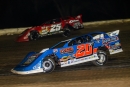 Ricky Thornton Jr. (20rt) regains the lead from Shane Clanton (25) on Feb. 4 en route to a Lucas Oil Late Model Dirt Series victory at All-Tech Raceway. (heathlawsonphotos.com)
