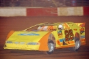 Despite a sore shoulder, Shane Clanton steers toward a $3,000 victory in the Spring Short Track Championships at Dixie Speedway in Woodstock, Ga., on March 19, 2005. Clanton started sixth, but led every lap after a series of events vaulted him to the front row before an official lap was complete. (Brian McLeod)
