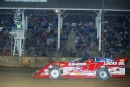 Jacksonville, Fla.’s Earl Pearson Jr. takes the checkered flag at Brownstown (Ind.) Speedway to win the ninth annual Indiana Icebreaker on April 1, 2006. (Chuck Gonzalez)