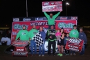 Jason Feger&#039;s team whoops it up in victory lane May 27 after a $5,000 MARS Championship Series victory at Fairbury (Ill.) Speedway. (joshjamesartwork.com)