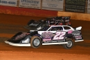 Hayden Cardwell (22) takes second from Phillip Thompson (7) en route to victory with the American All-Star Series at Smoky Mountain Speedway in Maryville, Tenn., on Saturday, May 27, 2023. Cardwell’s Mayhem in the Mountains triumph paid $3,000. (mrmracing.net)