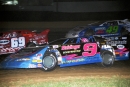 Billy Drake (9) heads to victory at Brownstown (Ind.) Speedway in the 18th annual Kenny Simpson Memorial on June 1, 2002. The Bloomington, Ill., driver held off Don O’Neal for a $2,000 triumph. (Todd Turner)