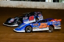 Ricky Thornton Jr. passes Daulton Wilson for June 2&#039;s win on night one of the Historic 100 at West Virginia Motor Speedway in Mineral Wells, W.Va., with the Lucas Oil Late Model Dirt Series. (heathlawsonphotos.com)