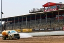 Eldora Speedway&#039;s frontstretch gets a dose of water ahead of Thursday&#039;s Dream XXIX prelim action. (joshjamesartwork.com)