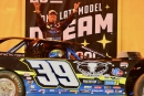 Tim McCreadie emerges in victory lane June 8 at Eldora Speedway, where he captured a $12,000 Dream XXIX semifeature. (joshjamesartwork.com)