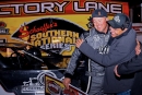 Ethan Dotson of Bakersfield, Calif. (left) is congratulated in victory lane by team owner Brett Coltman (right), following his dominant flag-to-flag victory in Thursday's $7,553 Schaeffer's Spring Nationals season opener at Waycross Motor Speedway. (Zackary Washington)