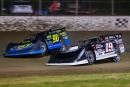 Spencer Hughes (19m) battles alongside Brian Rickman (90) in the early stages before leading all 40 laps and winning Saturday's $3,000 MSCCS stop at Magnolia Motor Speedway. (Chris McDill)