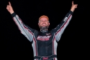 Josh Putnam on May 26 celebrates his $10,053 Schaeffer's Spring Nationals victory at Duck River Raceway Park in Wheel, Tenn. (Zackary Washington/Simple Moments Photography)