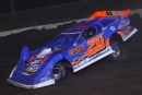 Ricky Thornton Jr. sports right-front damage on his way to a $20,000 victory in May 28&#039;s 50-lap Castrol FloRacing Night in America feature at Macon (Ill.) Speedway. (joshjamesartwork.com)