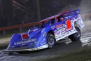 Brandon Sheppard en route to April 12&#039;s 18th annual Illini 100 victory at Farmer City (Ill.) Raceway on the World of Outlaws Late Model Series. (joshjamesartwork.com)