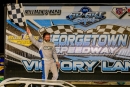 A triumphant Gregg Satterlee climbs out after his $8,000 Fall Clash victory Oct. 31 at Georgetown (Del.) Speedway. (Jason Walls/wrtspeedwerx.com)