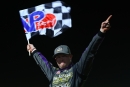 Bobby Pierce celebrates his $25,000 victory in April 11's World of Outlaws-sanctioned Illini 100 finale at Farmer City (Ill.) Raceway. (joshjamesartwork.com)