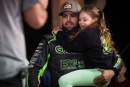 Mason Zeigler and daughter Ivy in victory lane May 17 at Bedford (Pa.) Speedway following his second career World of Outlaws Late Model Series victory. (Emily Schwanke/woolms.com)