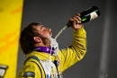 Tyler Erb drinks up his $100,000 World of Outlaws Late Model Series victory after a surprise purse boost May 29 at Mansfield (Ohio) Speedway. (Emily Schwanke/woolms.com)