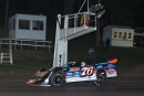 Jason Hahne takes the checkers July 23 at Hamilton County Speedway in Webster City, Iowa, on the Malvern Bank West Series. (mikerueferphotos.photoreflect.com)