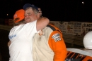Car owner Frank Detamore hugs Al Humphrey (right) after his career-richest $4,000 WDRL victory on July 31, 2003, at Southern Iowa Speedway in Oskaloosa. (DirtonDirt.com)