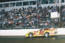 Don O'Neal takes the checkers May 8, 2004, at La Salle (Ill.) Speedway in Stacker 2 Xtreme DirtCar Series action. (Greg Bauer)