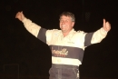 Scott Haus of Hamburg, Pa., climbed atop his car in Thunder Valley Raceway's victory lane after his $12,000 STARS victory July 6, 2002, in Central City, Pa. (rickschwalliephotos.com)