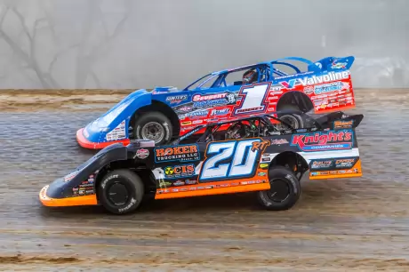 Ricky Thornton Jr. (20RT) passes Brandon Sheppard (1). (Heath Lawson)