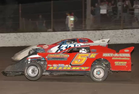 Mike Kirby (5k) and Clay Daly (32B) battle up front. (photofinishphotos.com)