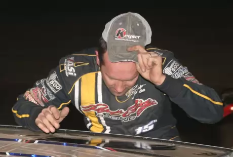 Birkhofer's traditional kiss of the car. (Todd Battin)