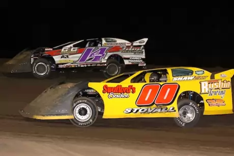 Winner Jesse Stovall (00) works past Brad Looney (14). (Ron Mitchell)