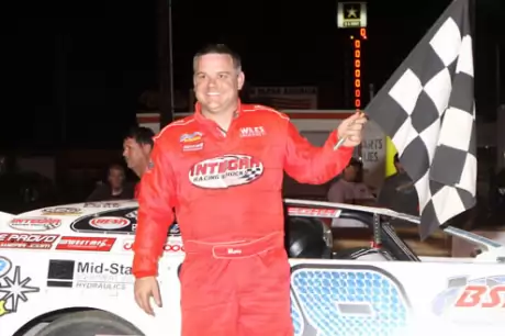 Jimmy Mars grabs his first checkered flag at Hagerstown. (pbase.com/cyberslash)