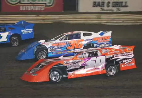 Todd Cooney (30) won the season opener. (Barry Johnson)